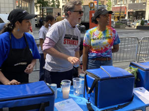 Stephen-Colbert-dishing-out-Ben-_-Jerry_s-on-the-NY-picket-line copy.jpg